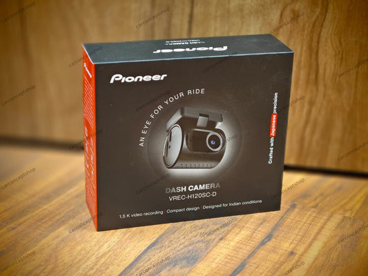 Pioneer VREC-H120SC-D ultra-compact dash camera in a matte black finish featuring a 2MP lens and integrated mounting bracket.