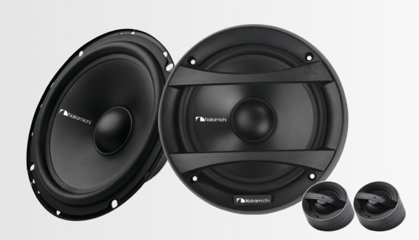 Nakamichi NSE-CS1628 6.5-inch 2-way component speaker system, featuring separate woofer drivers, silk dome tweeters, and external crossover components on a neutral background.