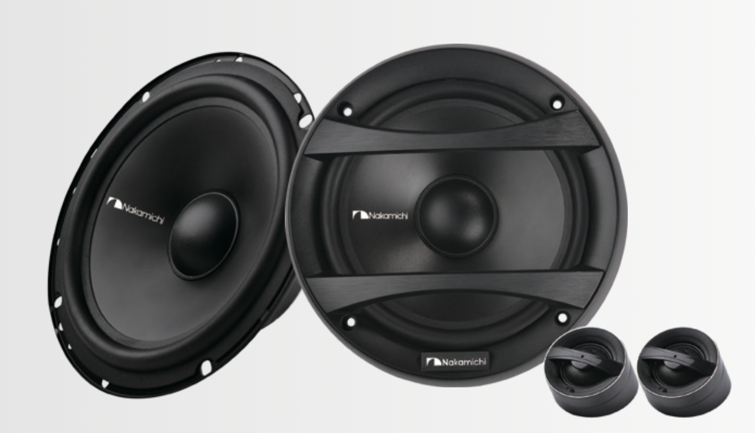 Nakamichi NSE-CS1628 6.5-inch 2-way component speaker system, featuring separate woofer drivers, silk dome tweeters, and external crossover components on a neutral background.